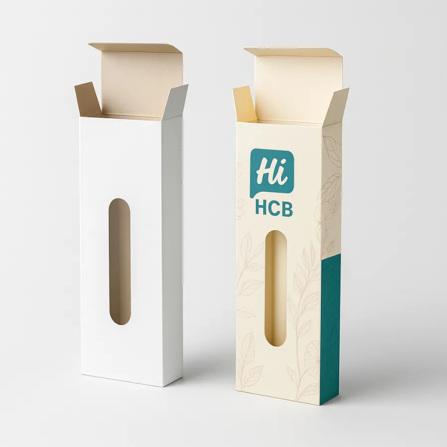 Plain white and decorated tall boxes with a vertical oval cutout for viewing a taper candle- class=